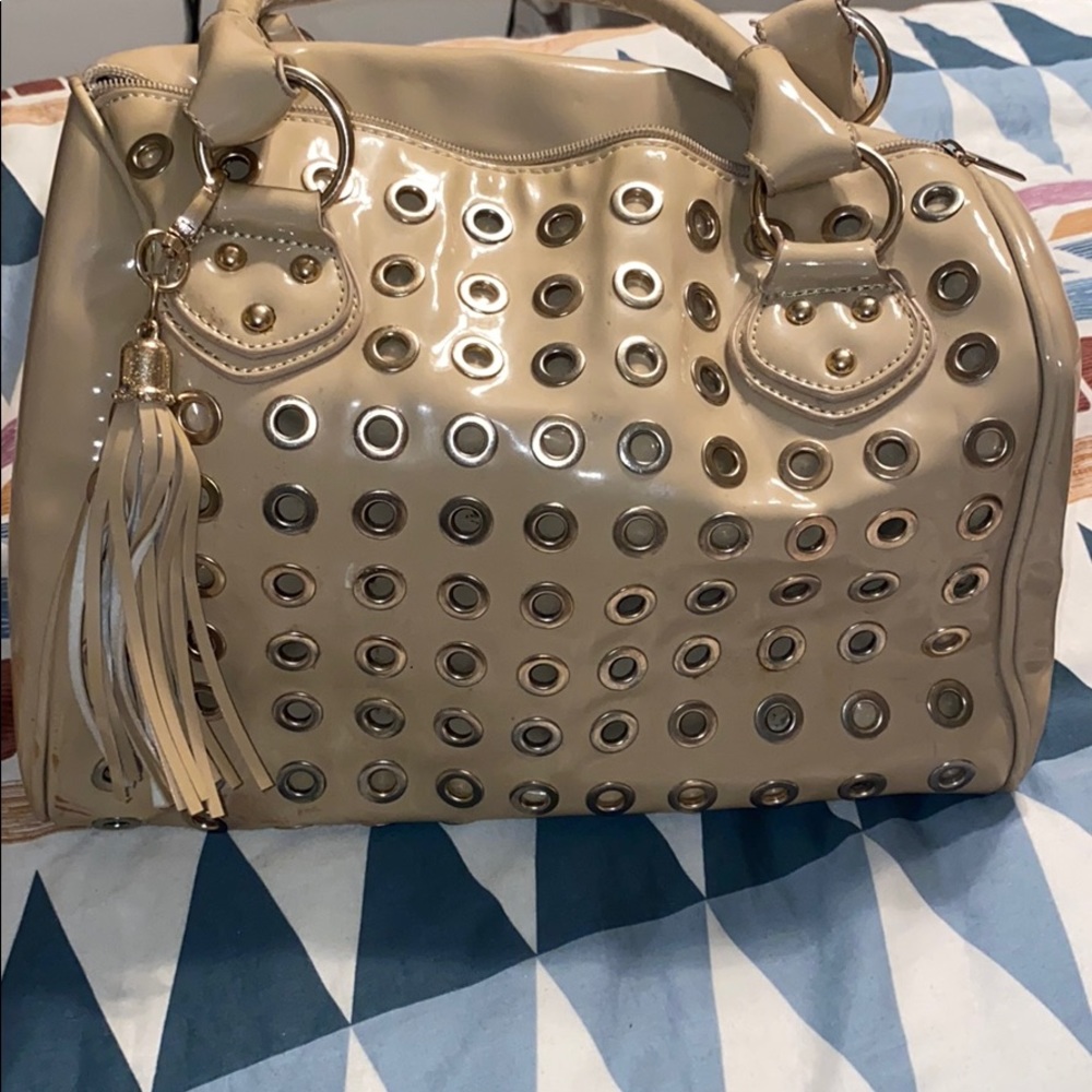 Fun studded hand bag
